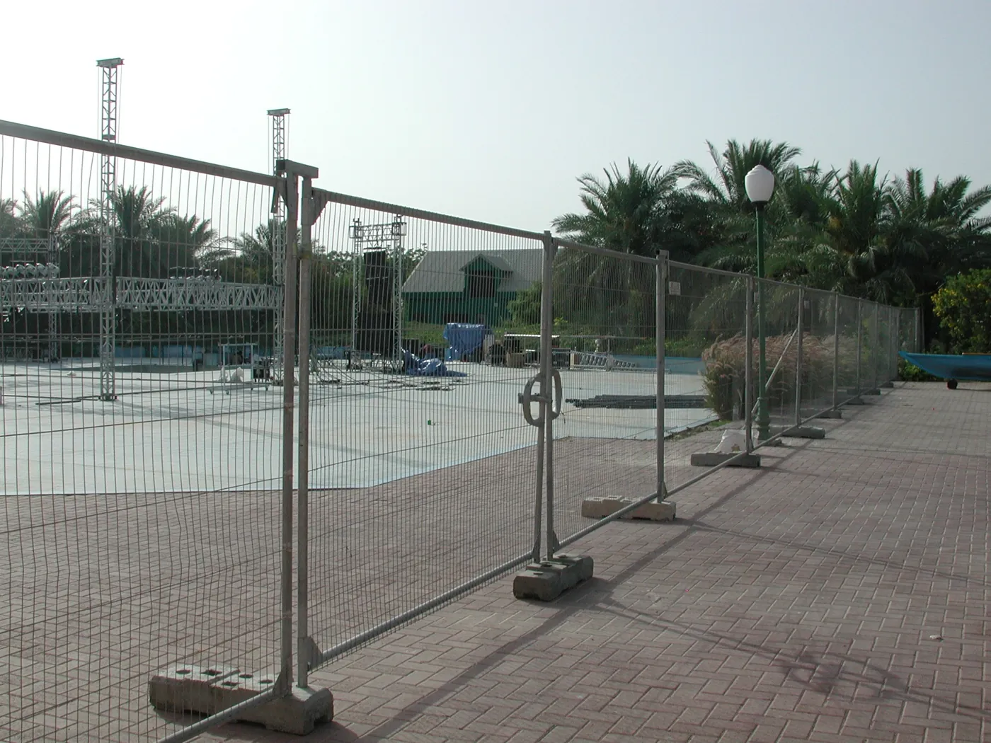How Do You Secure a Temporary Fence to the Ground?